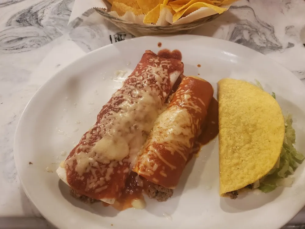 Chicken Nachos Supreme with a Chicken Taco and Chicken Quesadilla Plate